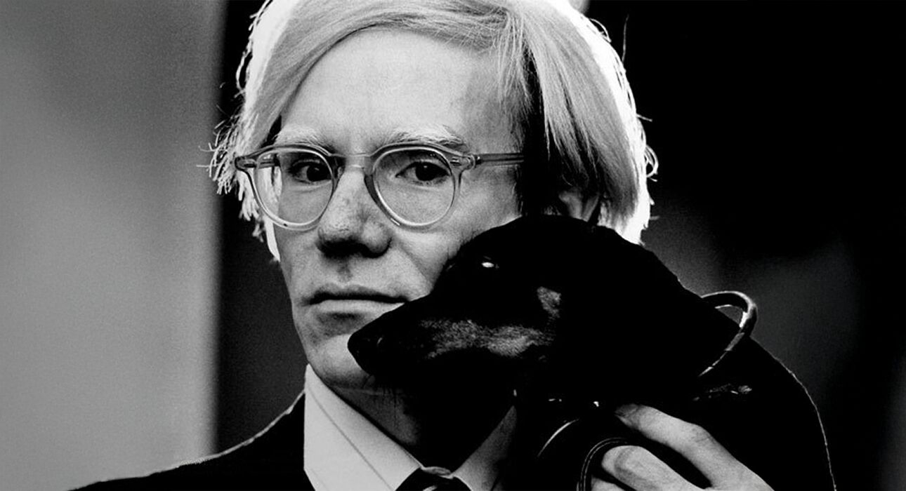 Andy Warhol with Archie, his pet Dachshund - by Jack Mitchell 1973